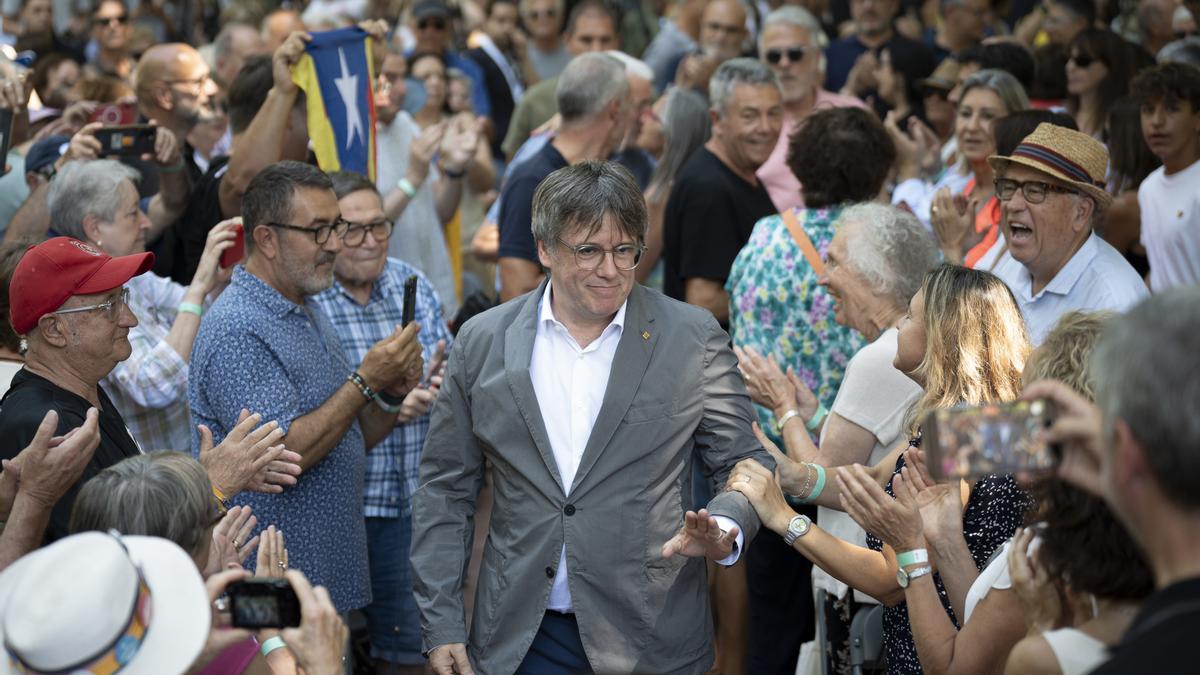 Puigdemont en el acto de apoyo de su partido JxCat