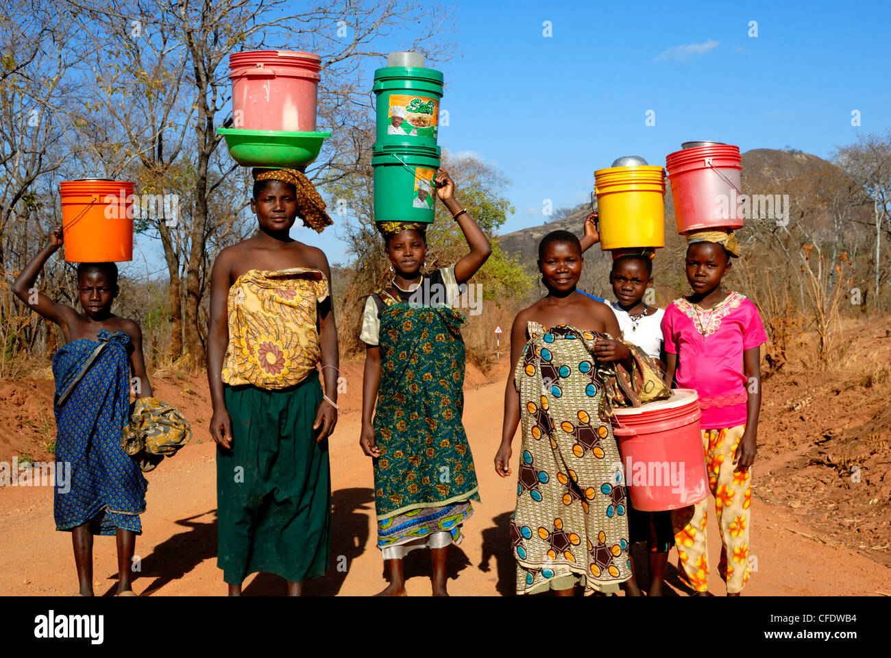 g-water-on-head-tanzania-east-africa-africa-CFDWB4.jpg