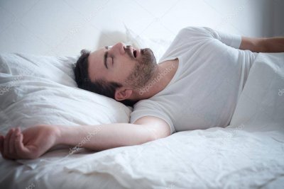 depositphotos_124737314-stock-photo-man-sleeping-in-his-bed.jpg