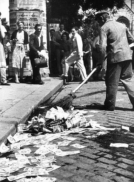 sweeping-paper-money-from-the-streets.jpg